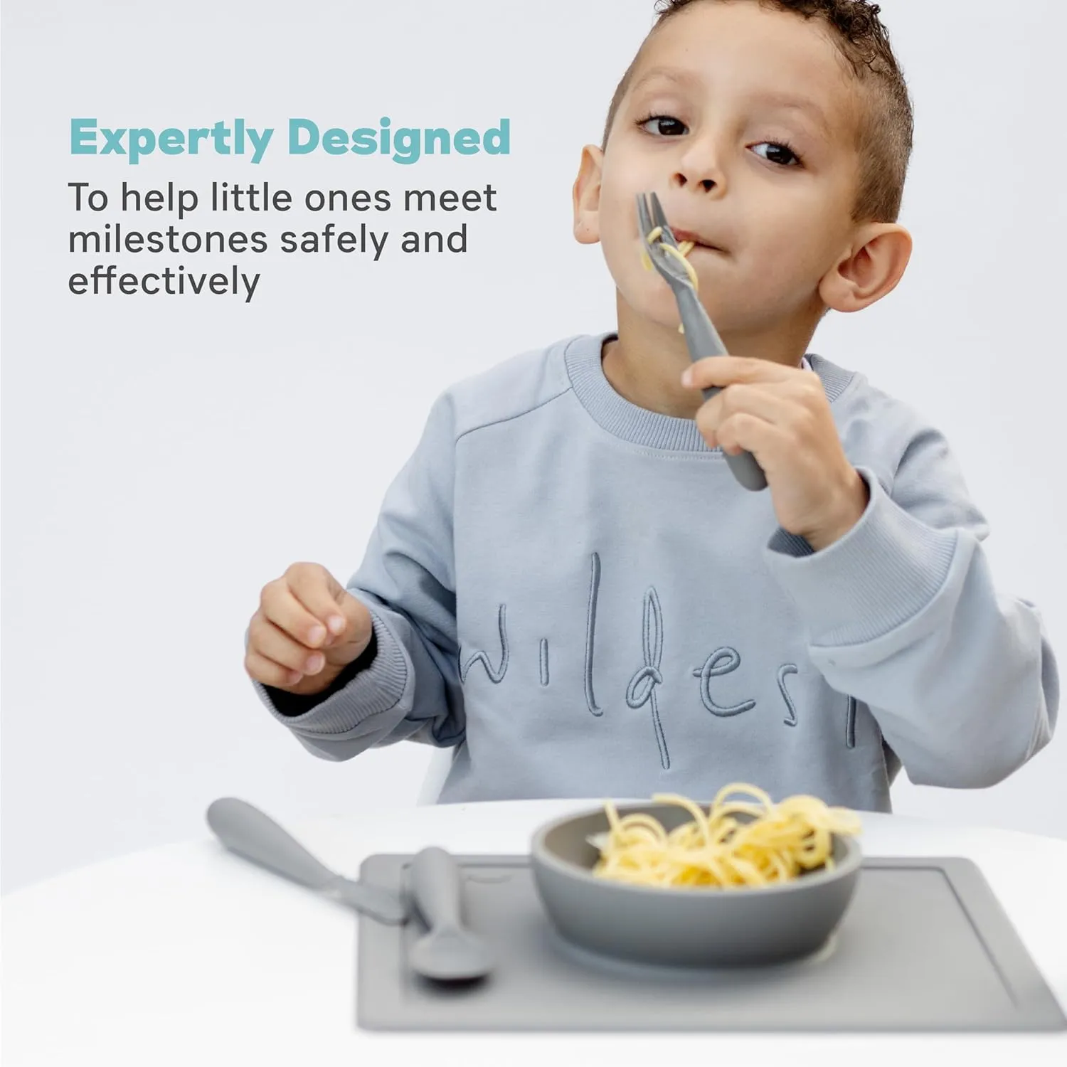 ezpz Happy Bowl - 24 Months   (Gray) - 100% Silicone Suction Bowl with Built-in Placemat  Dishwasher Safe